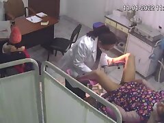 Real_hidden_camera_in_gynecological_cabinet_29 Excited Young Spouse Discovers New Depths of Passion with Partner